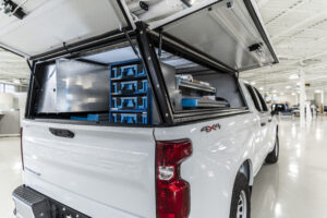 White work truck highlighting truck shelving